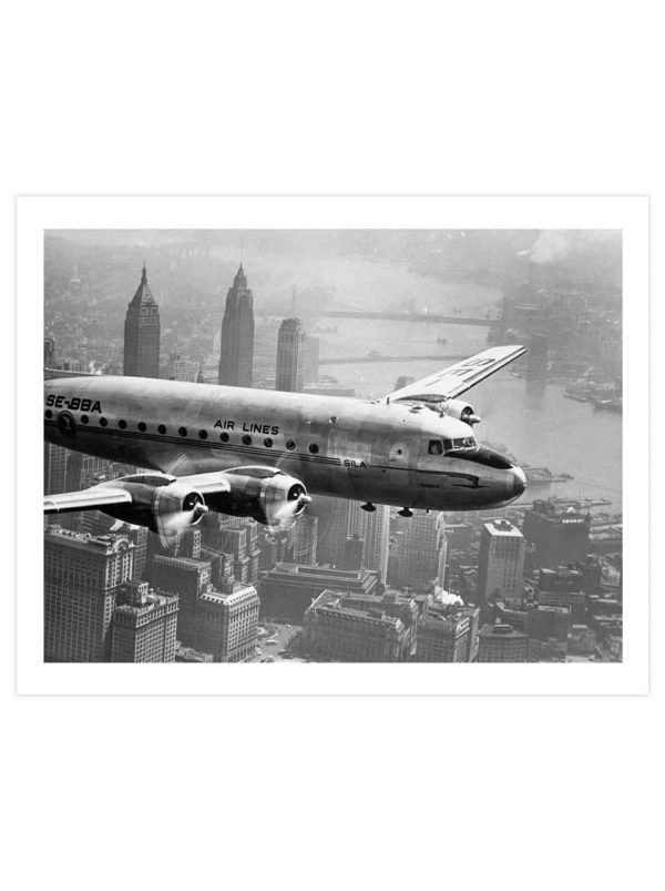 TRA-004-01-Aircraft-Flying-over-City-1946